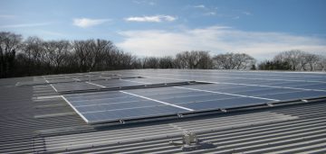 Large commercial solar installations. On the roof of a new build industrial unit in Clevedon